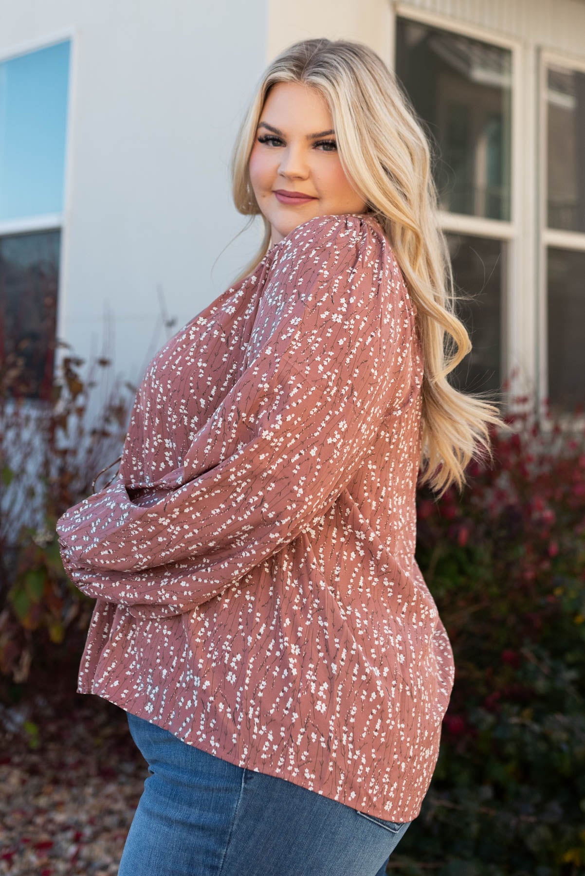 Side view of the plus size marsala floral blouse