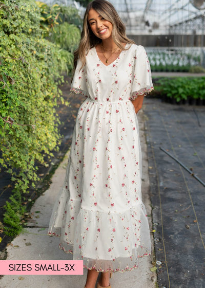 Short sleeve ivory embroidered floral dress with a v-neck