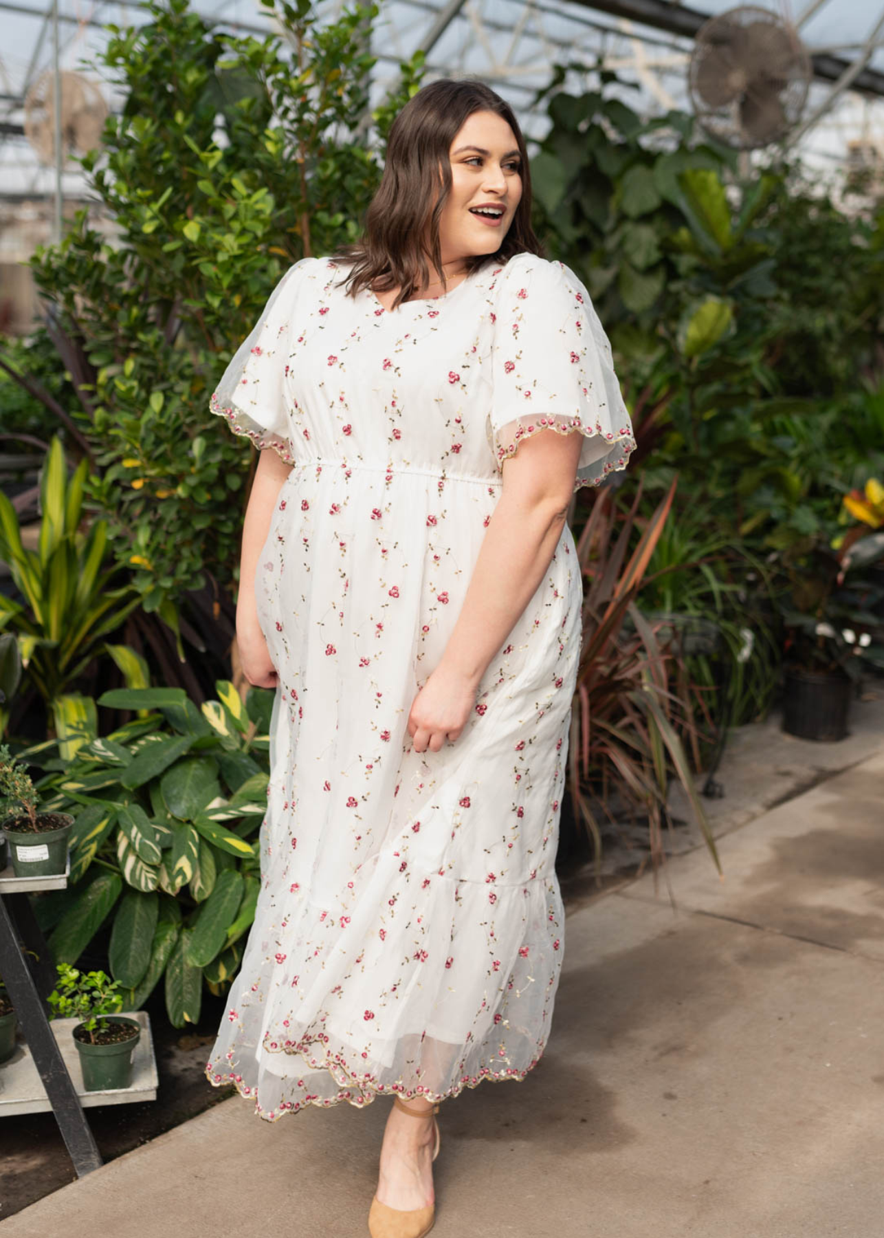 Plus size ivory embroidered floral dress with lace on the cuffs and hem