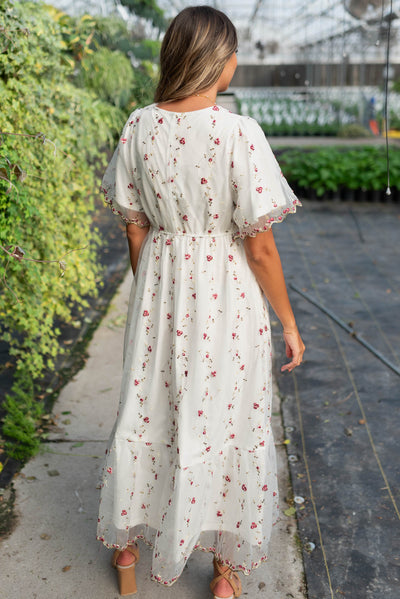 Back view of the ivory embroidered floral dress