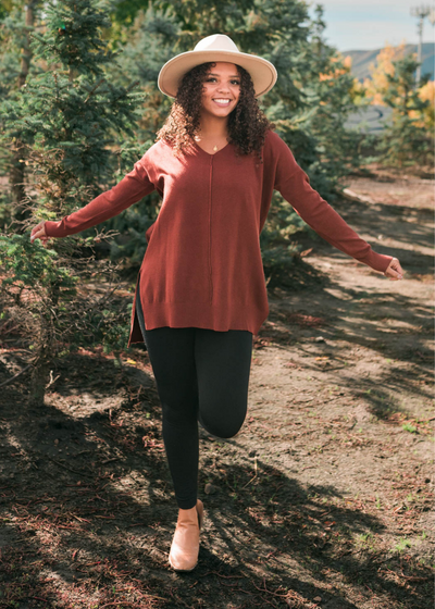 Dark rust v-neck sweater with long sleeves