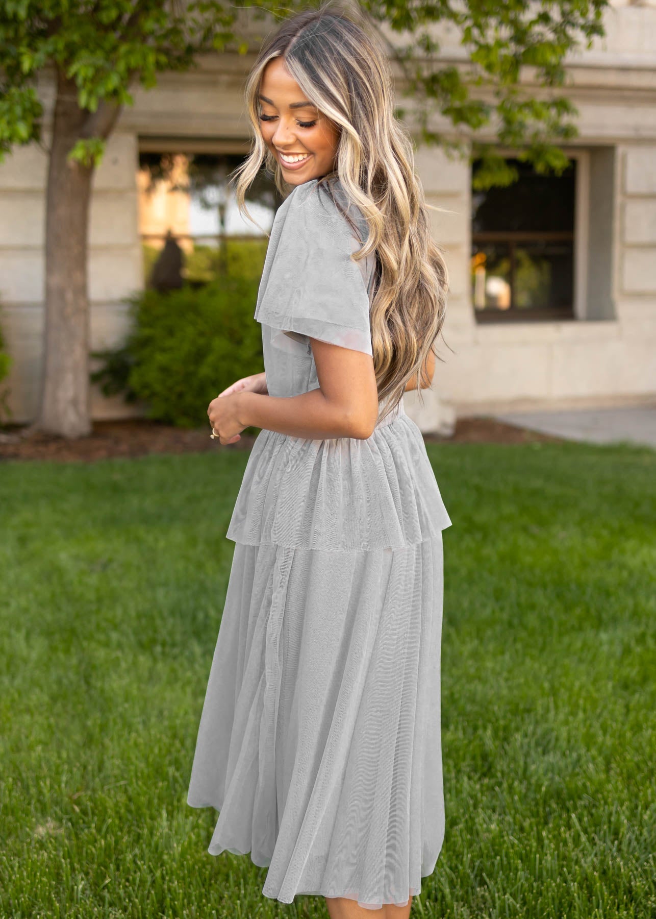 Side view of a short sleeve gray dress