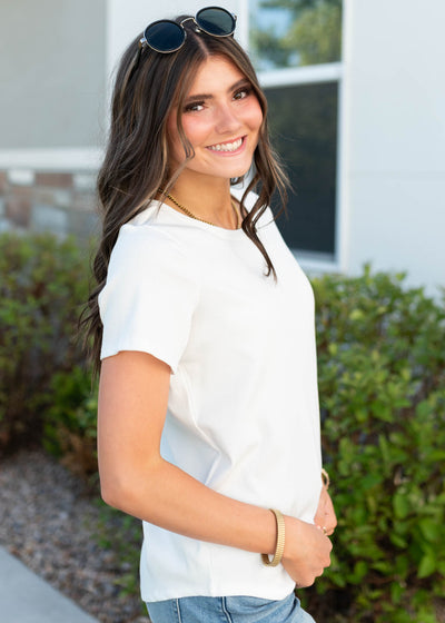 Side view of the white ribbed top
