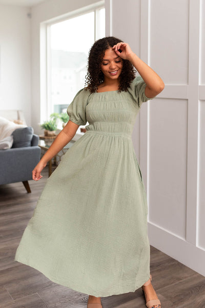Sage smocked dress with a square neck