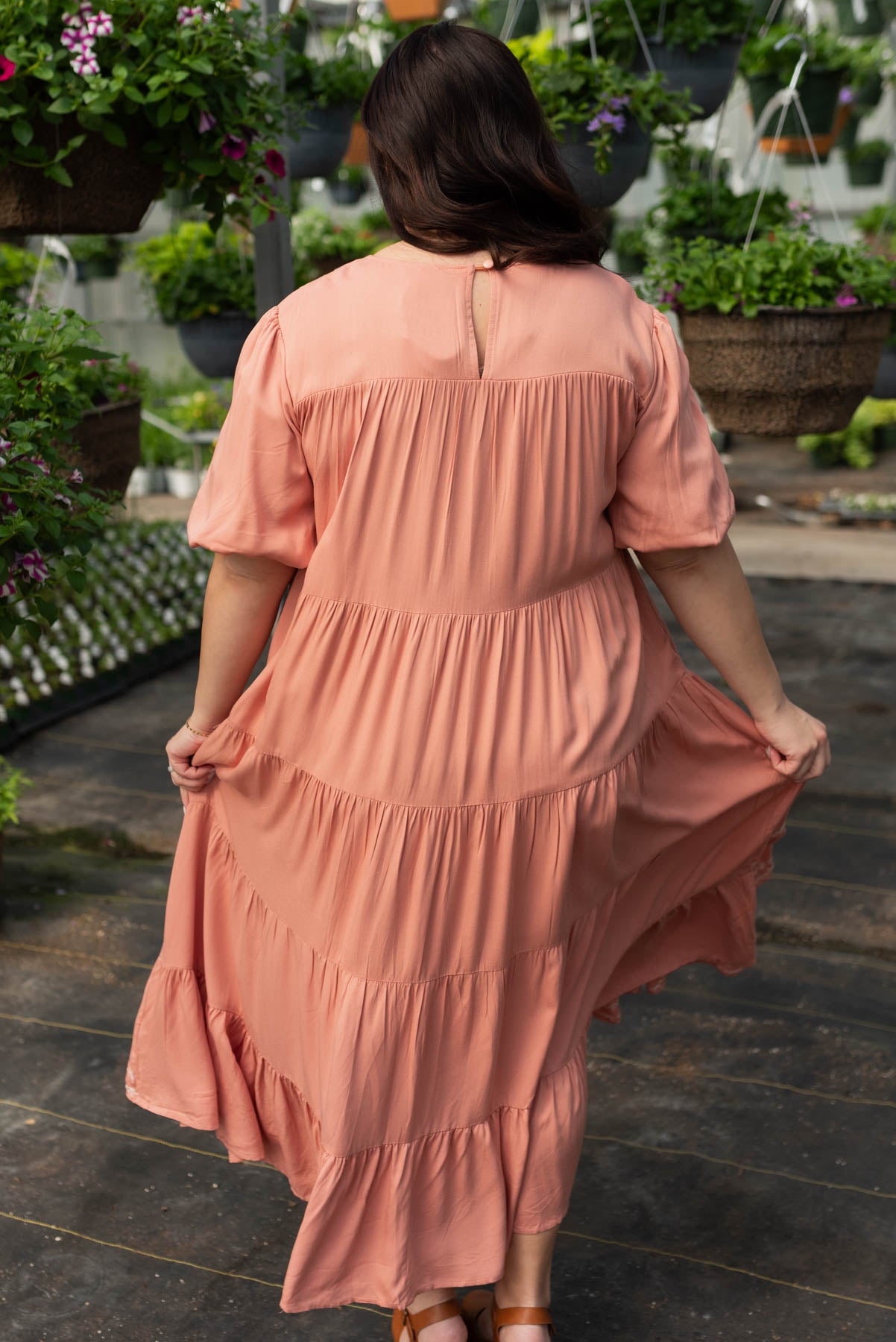Back view of the plus size dusty pink embroidered tiered dress