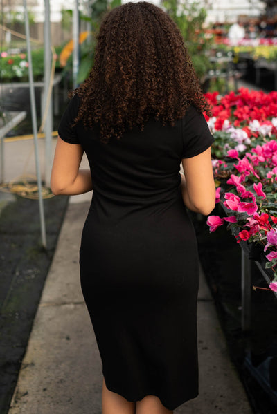 Back view of the black knit mini dress