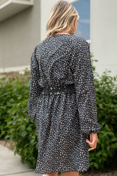 Back view of a black leopard dress