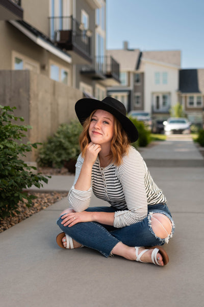 White stripe top with buttons at the neck