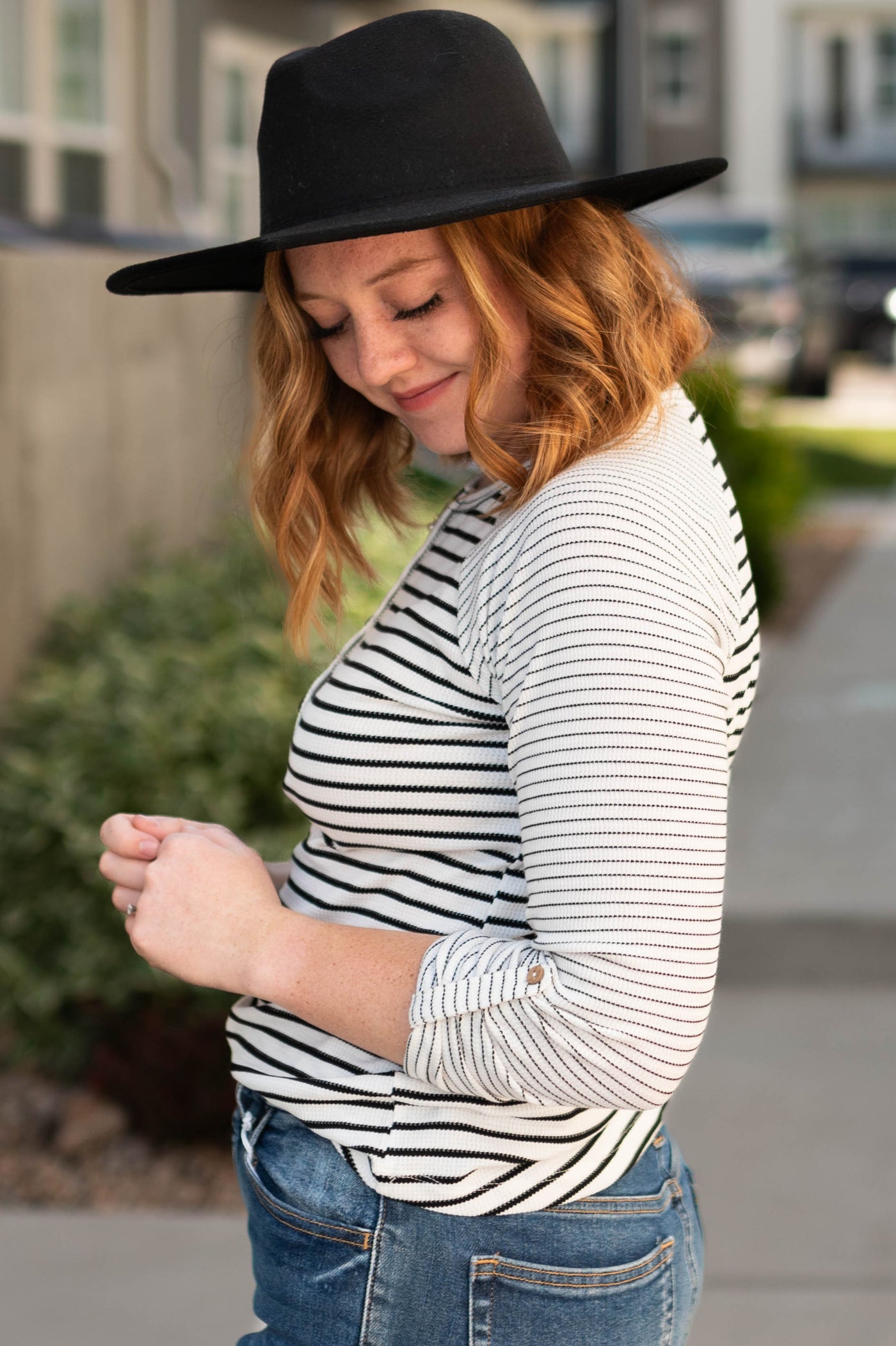 Side view of a white stripe top