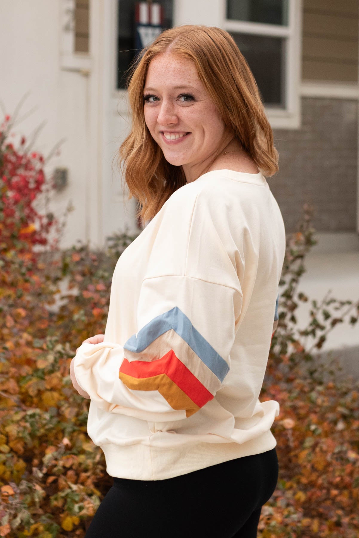 Side view of the retro stripe pullover