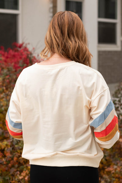 Back view of the retro stripe pullover