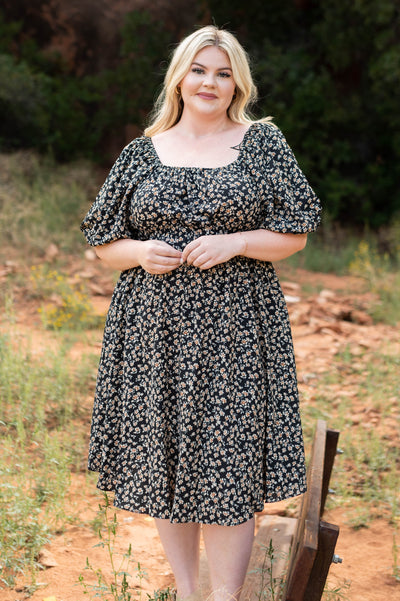 Short sleeve plus size black floral dress with a high waist and square neck