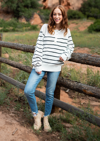 Long sleeve ivory sweater with black stripes