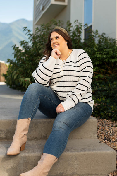 Long sleeve ivory sweater with black stripes
