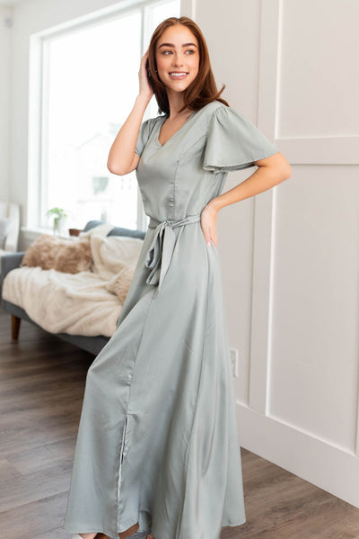 Side view of the sage satin dress