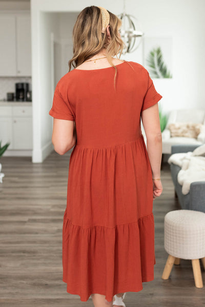 Back view of a cinnamon tiered dress