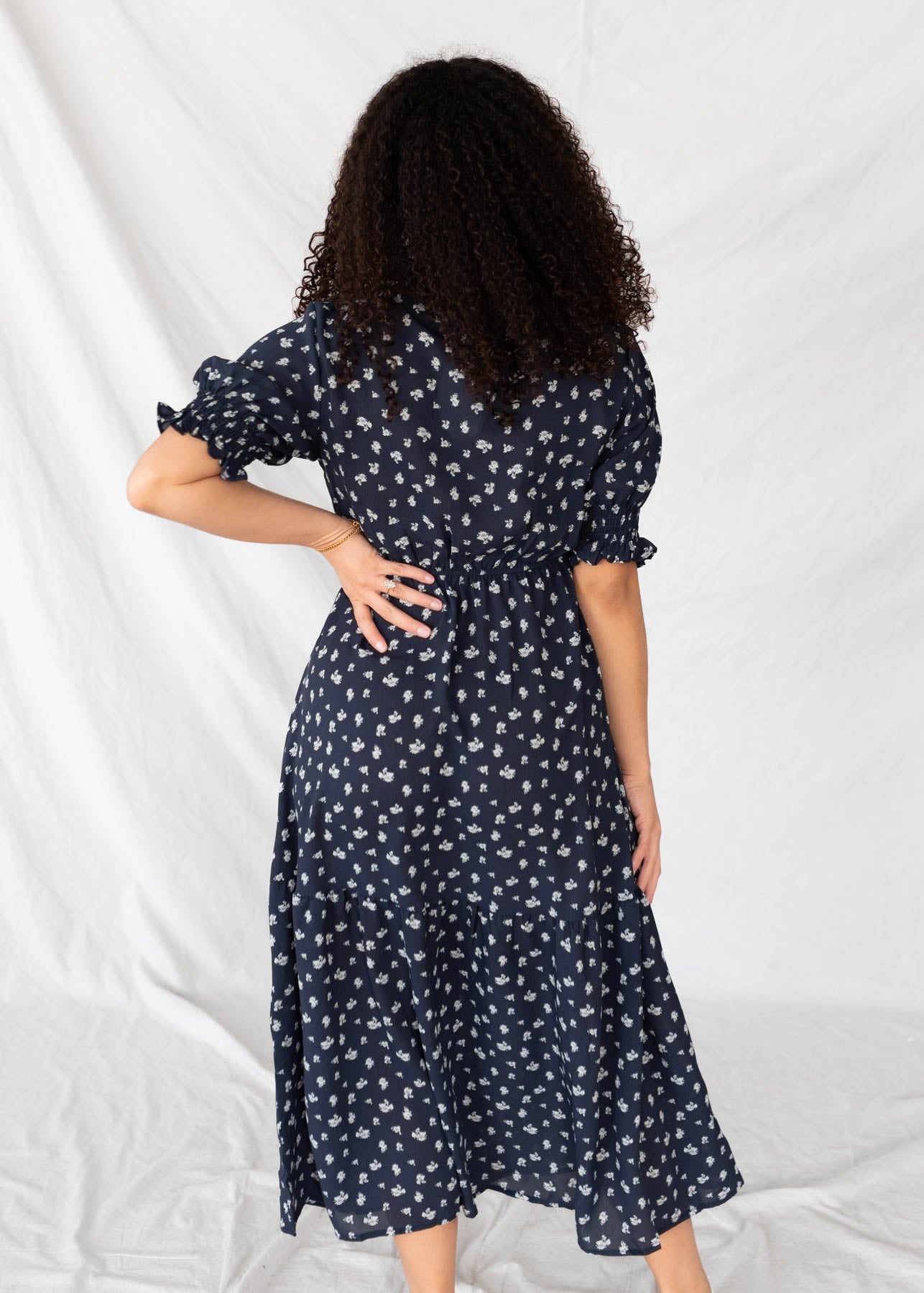 Back view of the navy floral dress