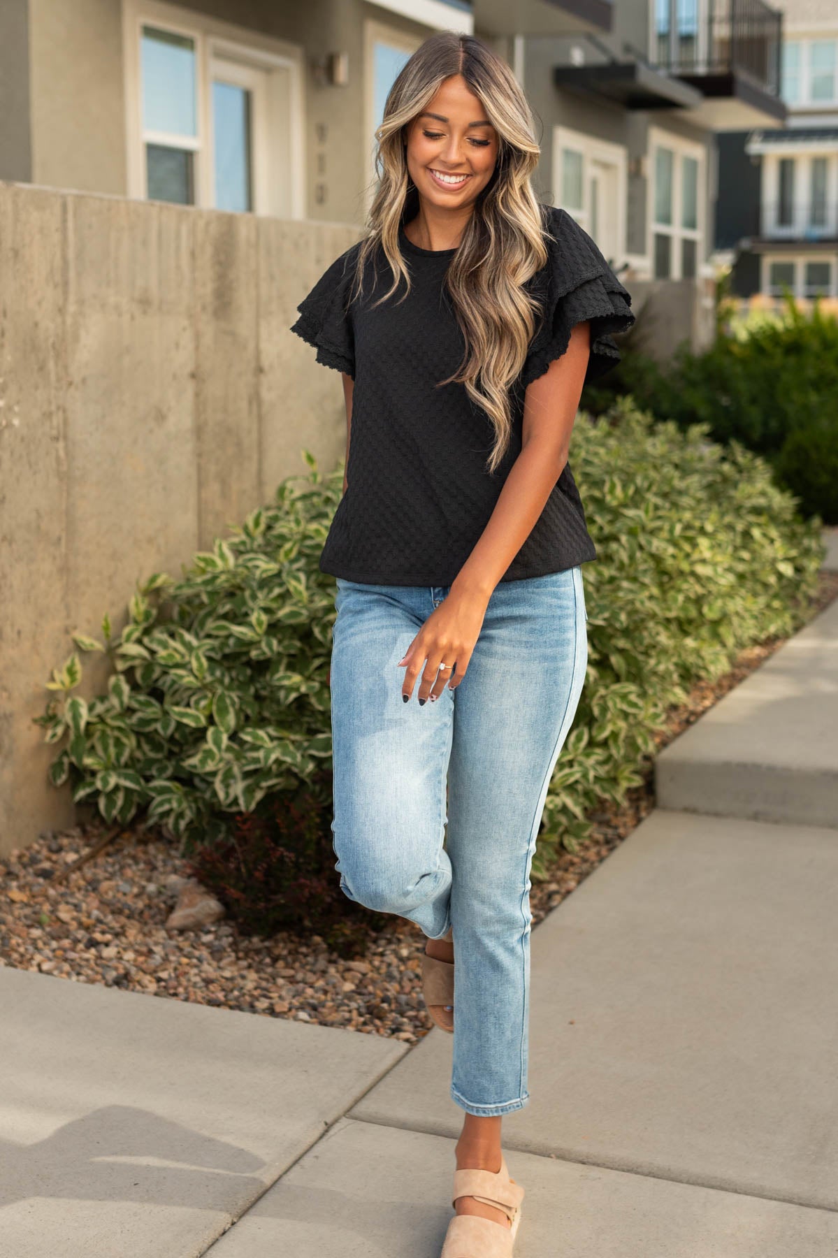 Ruffled sleeve black top