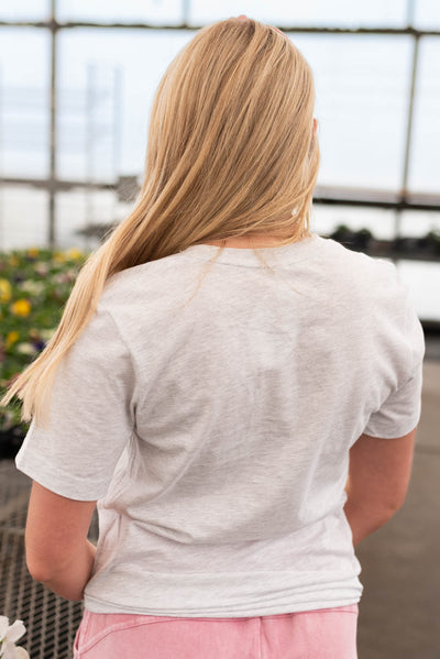 Back view of the pink wildflower graphic t-shirt