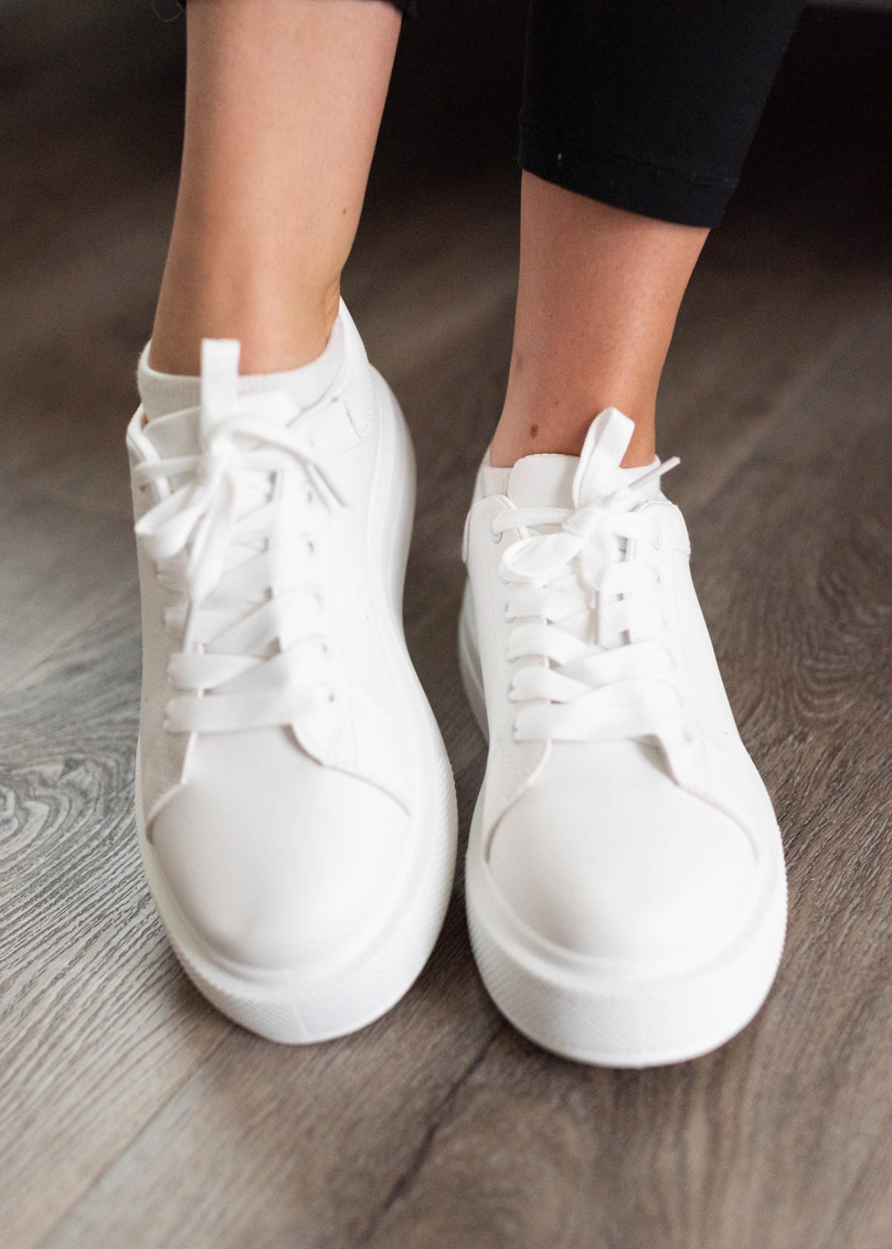 White lace up sneakers