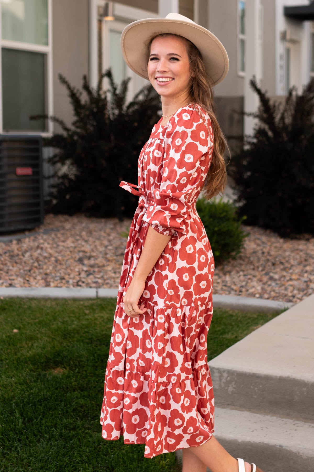 Side view of a brick floral dress