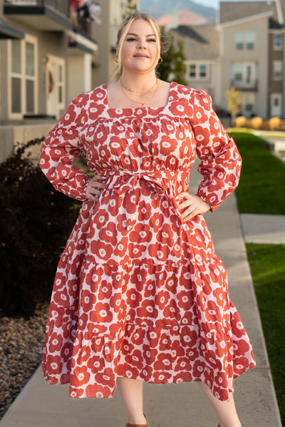 Plus size tiered brick floral dress that ties at the waist