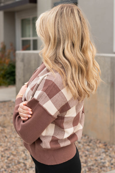 Side view of the mocha checkered sweater