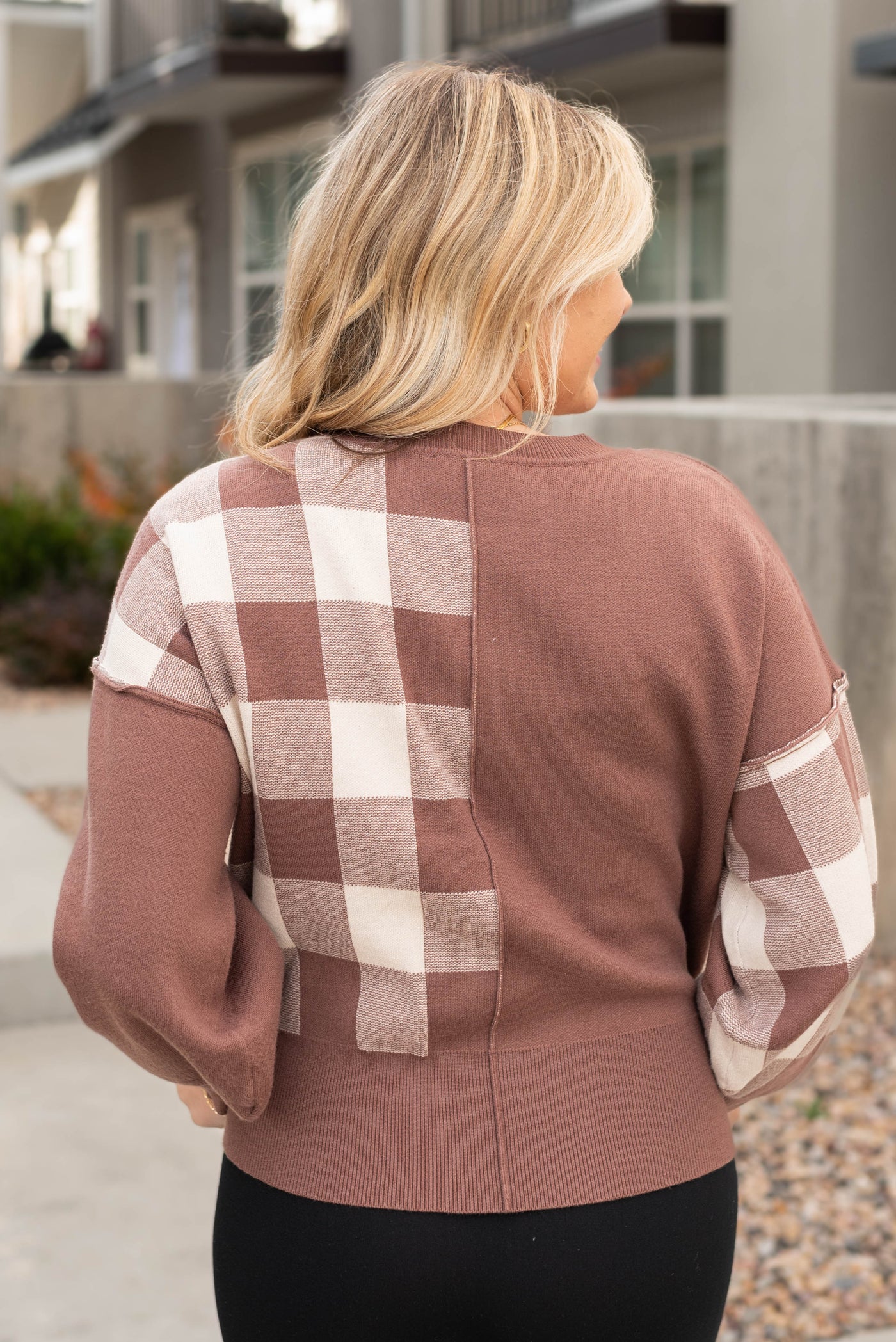 Back view of the mocha checkered sweater