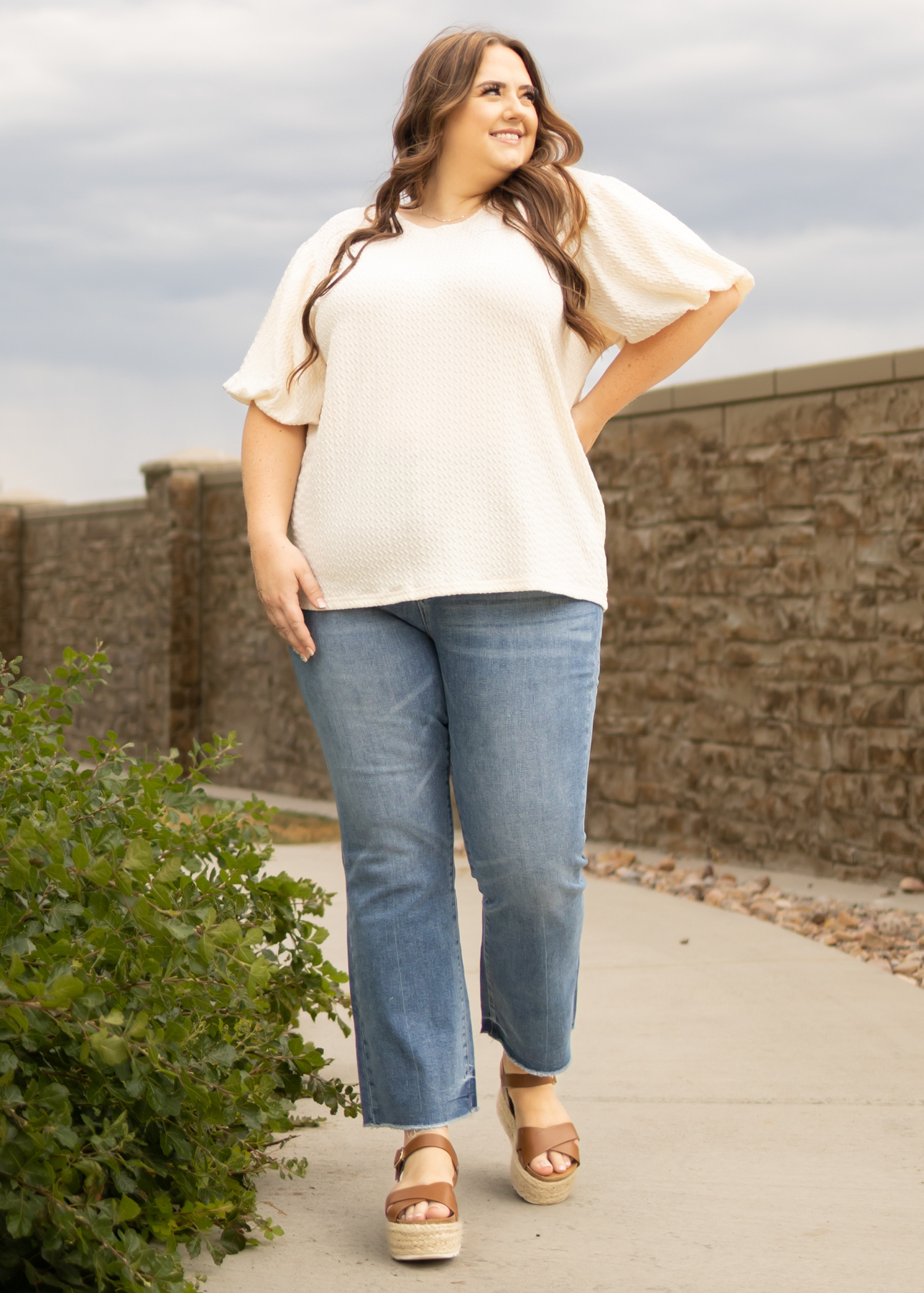 Plus size cream textured top with short sleeves