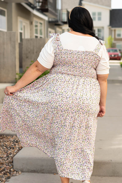 Back view of a plus size Lavender small floral sundress with tiered skirt and smocked top