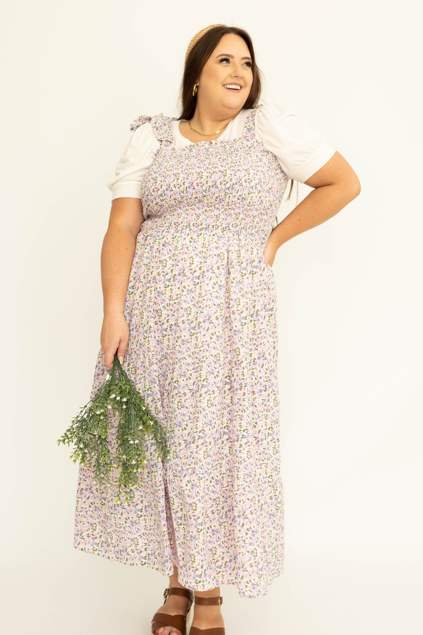 Front view of a plus size lavender sundress with straps that tie at the shoulders 