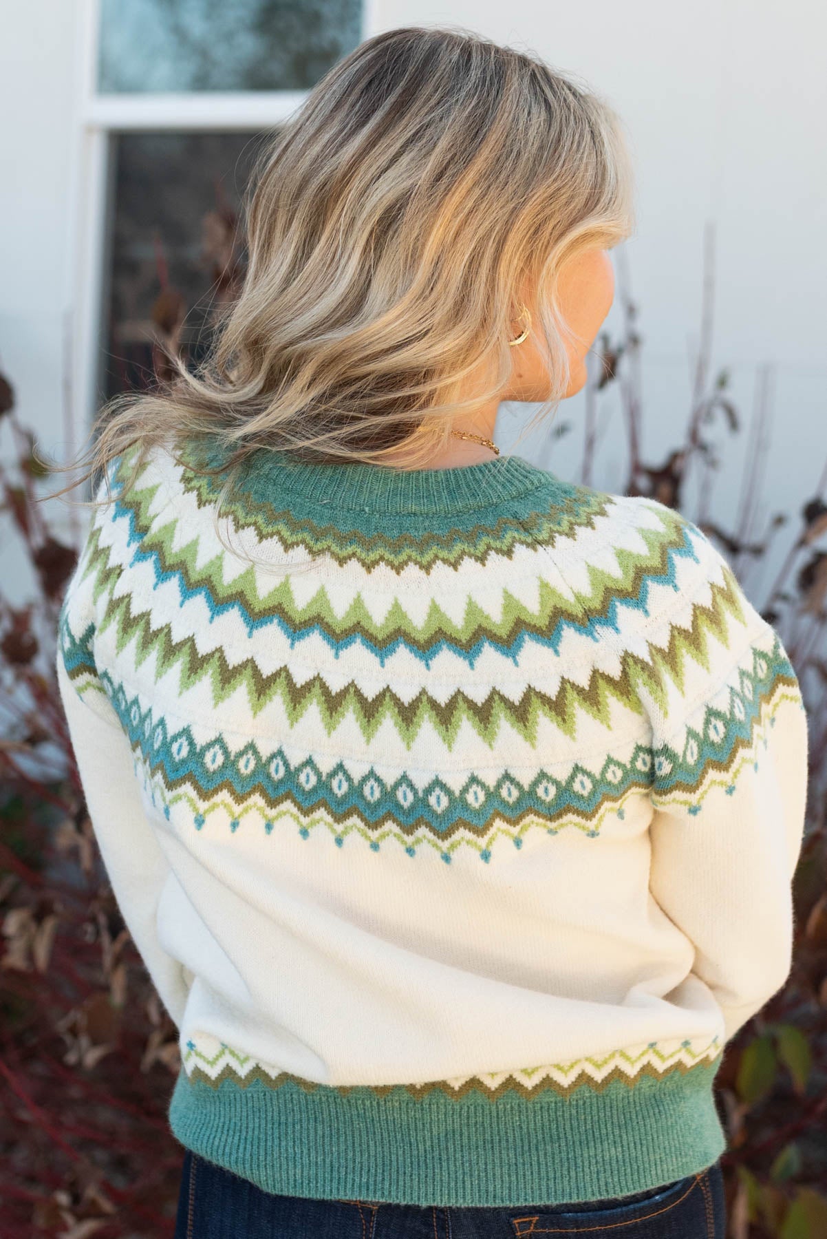Back view of the cream patter sweater