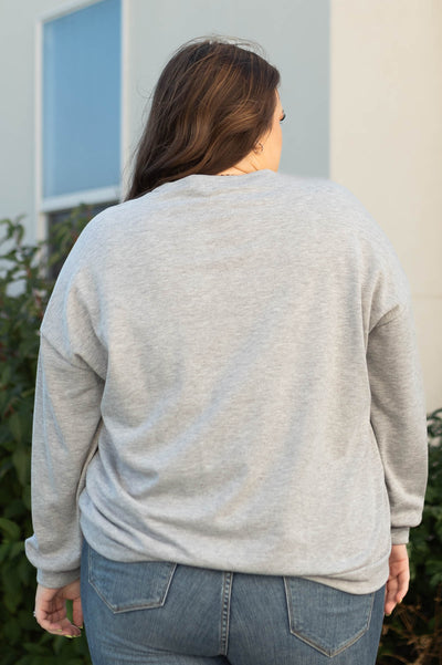 Back view of a plus size heather grey pullover