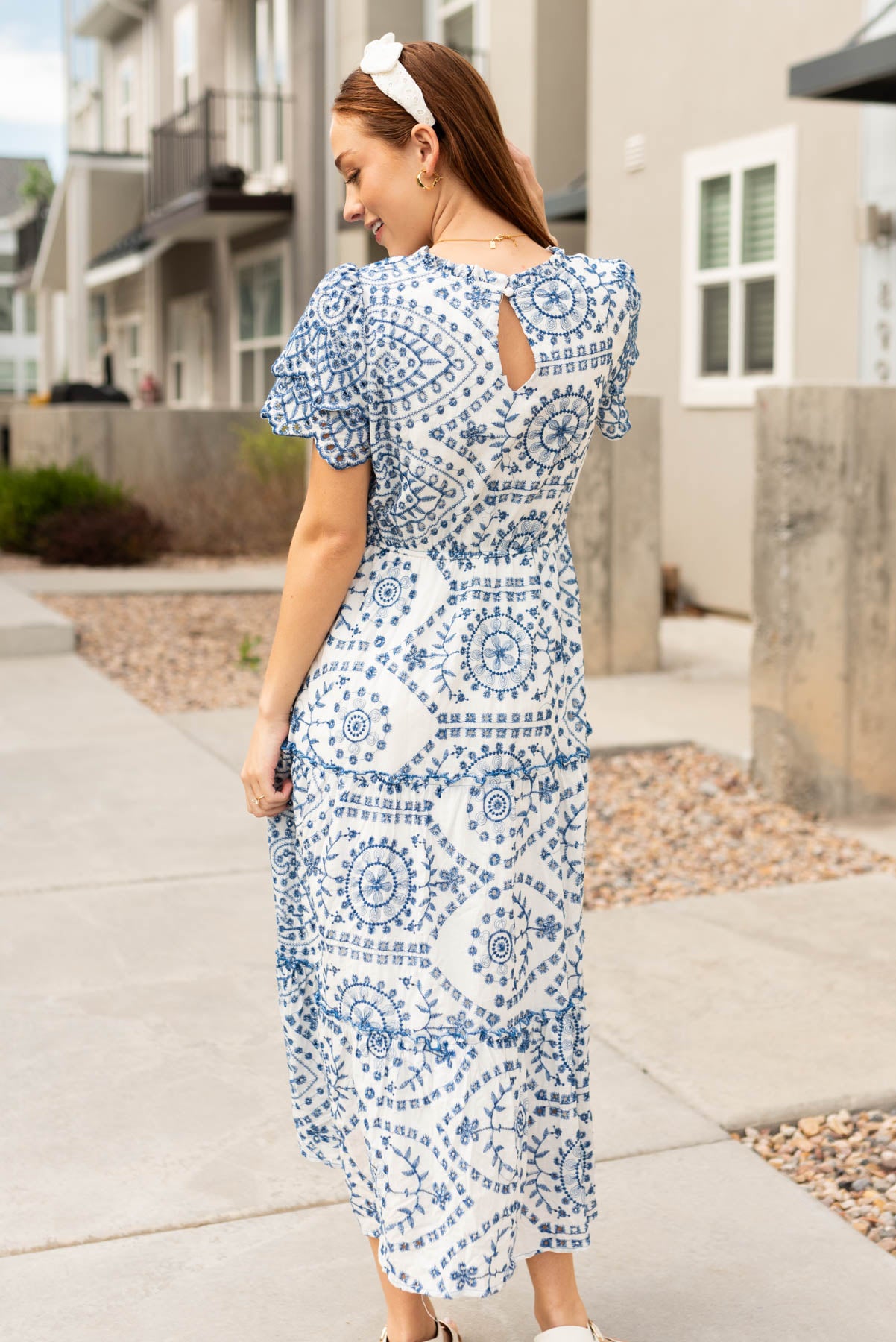 Back view of the blue embroidered dress