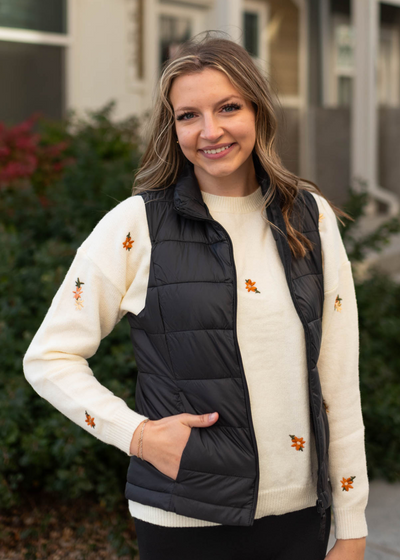 Black puff vest with pockets