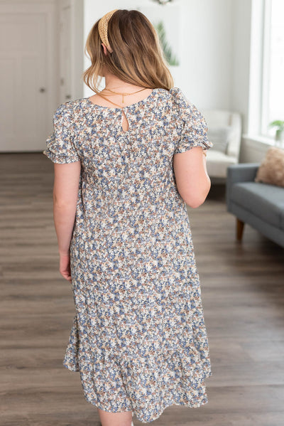 Back view of the blue floral dress