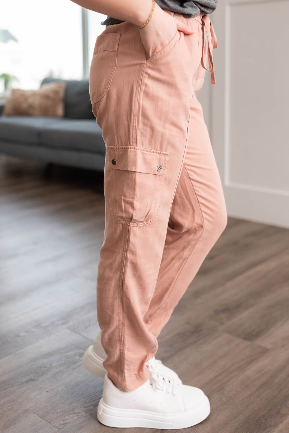 Side view of the dusty peach cargo joggers