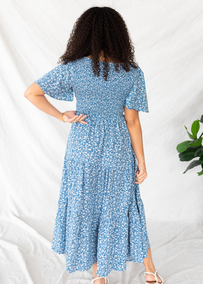 Back view of the blue flroal tiered dress