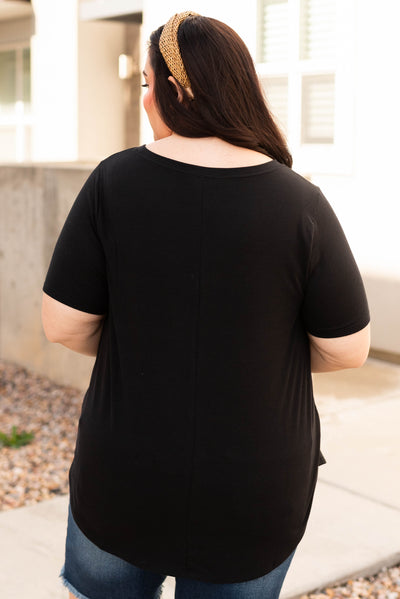 Back view of the black top in plus size