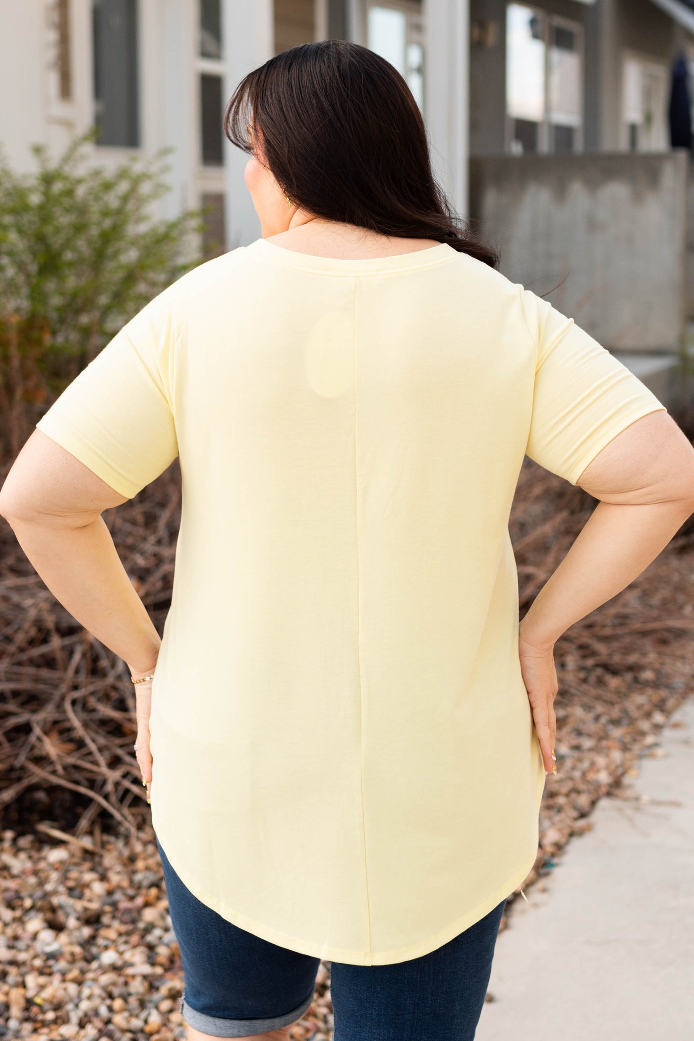 Back view of the plus size yellow top