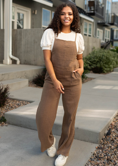 Brown jumpsuit with pockets and skinny straps