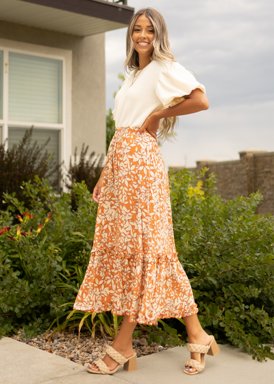 Side view of a rust floral skirt