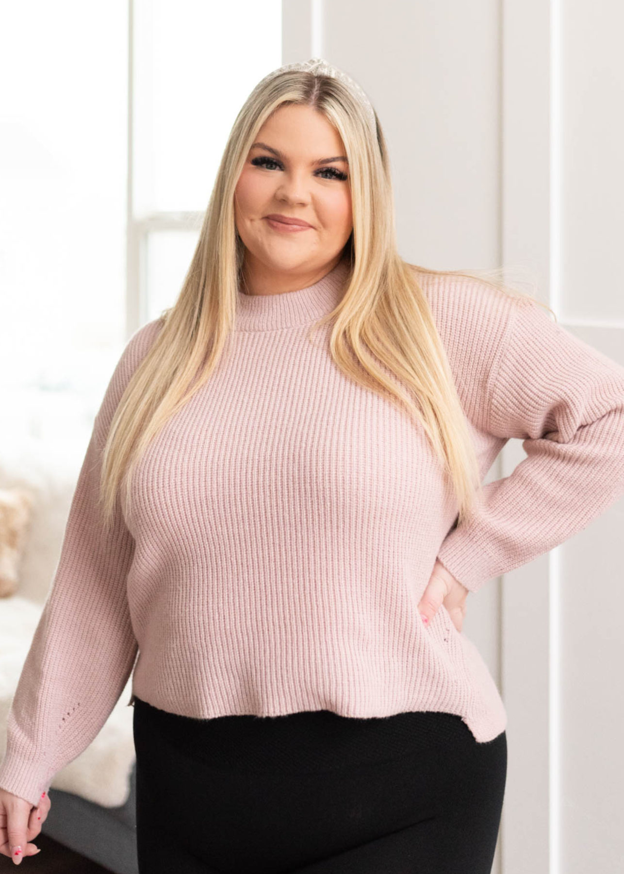 Plus size blush knit sweater with long sleeve and a high neck