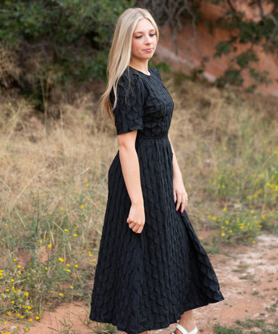 Side view of a black dress