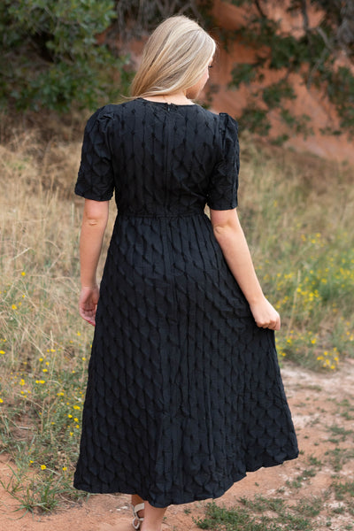 Back view of a black dress