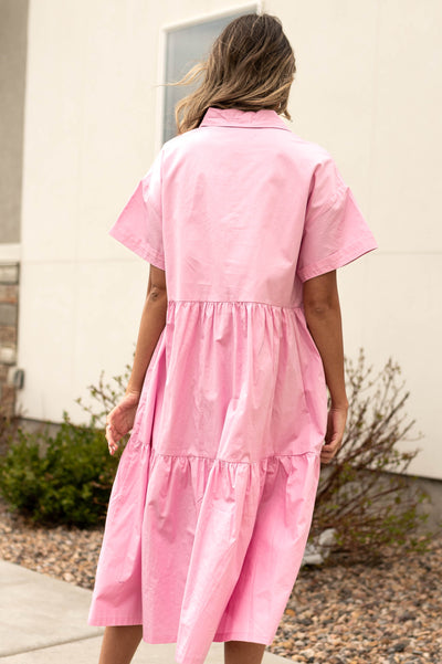 Back view of a strawberry milk pink dress