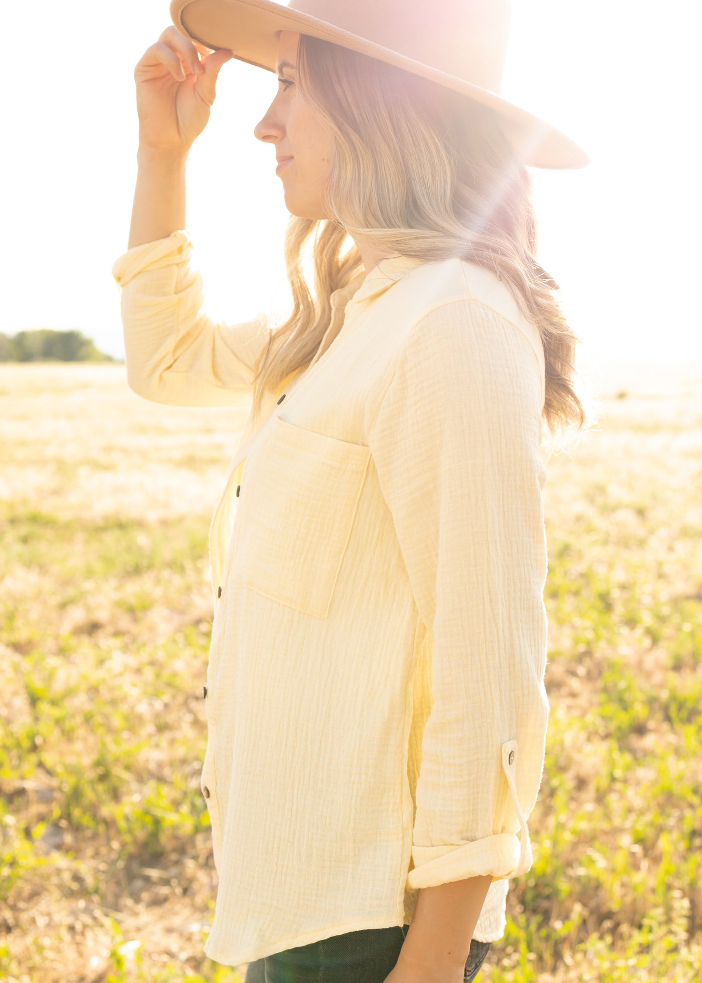 Side view of a yellow gauze top