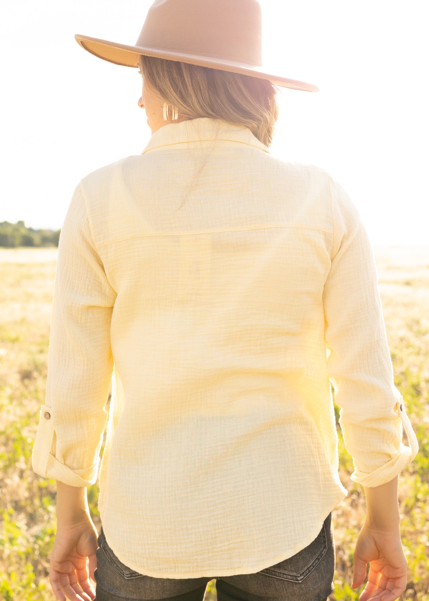 Back view of a yellow top