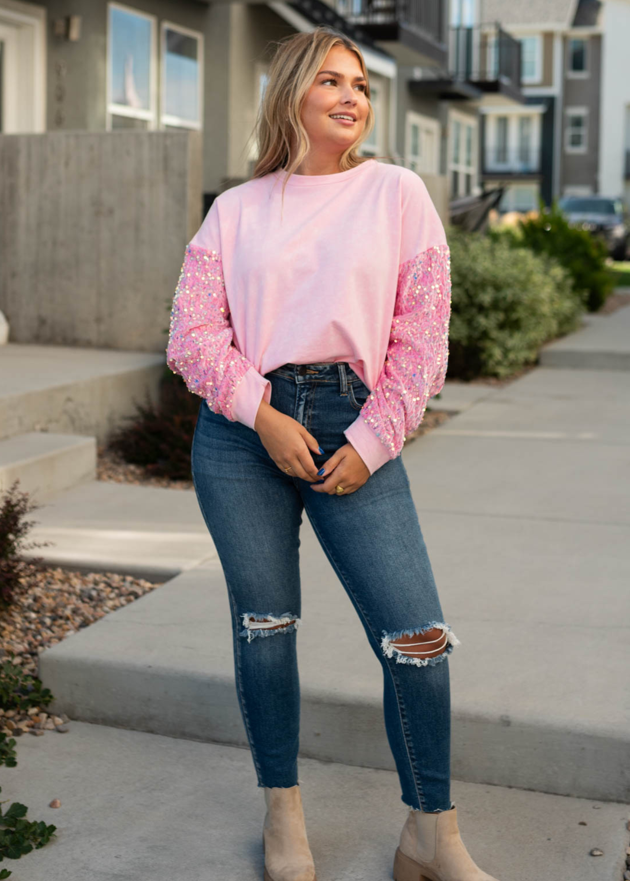 Pink pullover with sequence sleeves