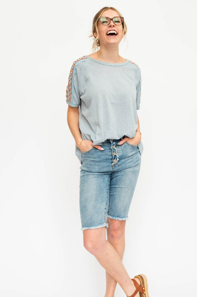 Embordered short sleeve chambray top